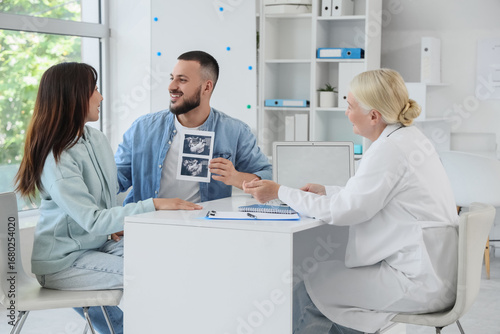 Young couple with sonogram ...