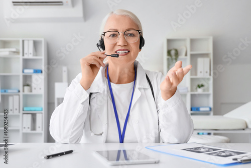Female doctor with headset ...
