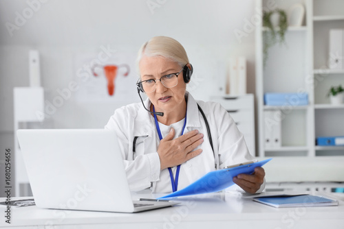 Female doctor with headset ...