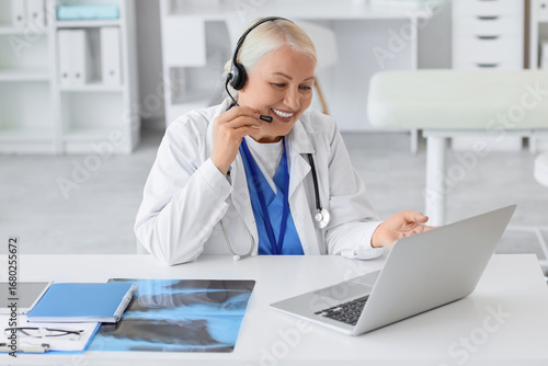 Female doctor in headset wi...