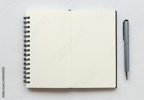 Wallpaper Mural Top View of a Blank Spiral Notebook with a Pen Torontodigital.ca