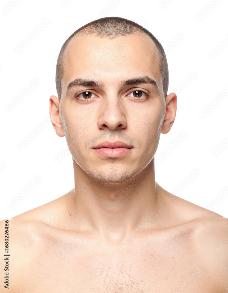 Obraz premium Young Man with Shaved Head Portrait on White Background.