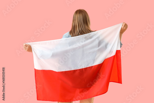 Young woman with flag of Po...