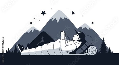 Adventurer Relaxing With Phone Under A Starry Sky During A Mountain Camping Trip