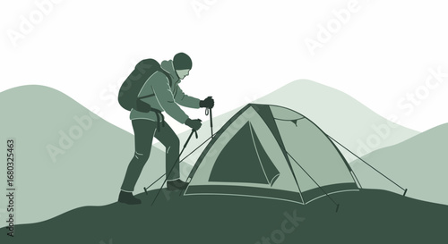 Adventurer Setting Up Camp Amidst Serene Mountains for Outdoor Exploration