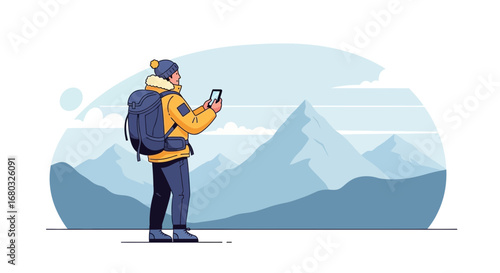 Adventurer using smartphone in the mountains exploring with a backpack and winter clothing