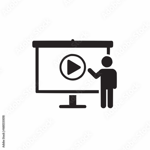 A person presenting a video presentation on a large screen.