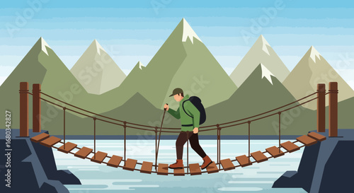 Active hiker crossing a suspension bridge in a scenic mountain landscape
