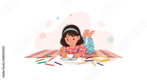 Adorable little girl drawing and coloring with crayons, lying on a carpet