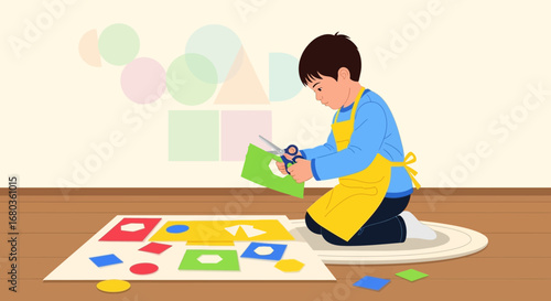 A young boy cutting shapes, engaged in a preschool activity of education and fun