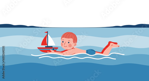 A young boy swims in the water holding a toy sailboat on a sunny day