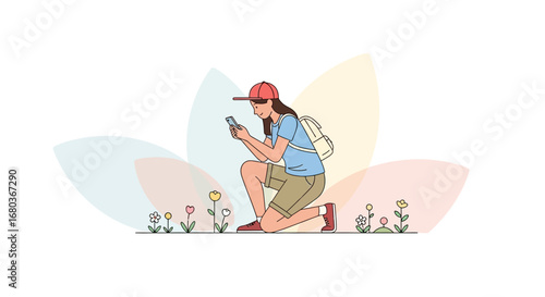 A young woman is in a field taking pictures of flowers with her smartphone