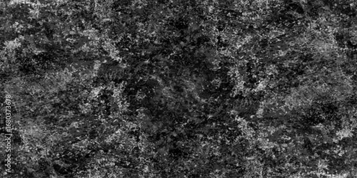 Abstract black grunge texture with dust grain and scratch patterns, dark concrete surface effect, distressed overlay background for vintage and cinematic style.