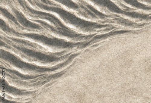 Sandy ripples on beige beach