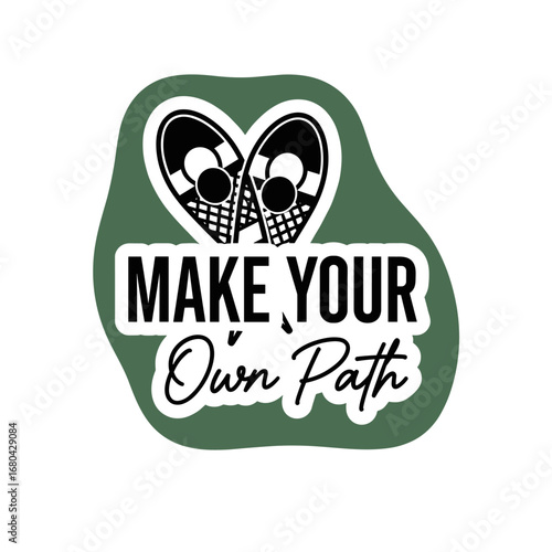 Make Your Own Path. Inspirational quote with snowshoes in a heart shape. Winter adventure graphic design for stickers and logos.