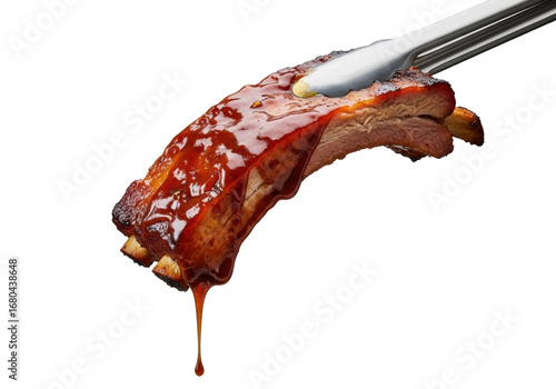 A single, perfectly grilled BBQ pork rib held by tongs, dripping glossy caramelized sauce, isolated on a transparent background with bokeh, appetizing food photography. Concept of deliciousness