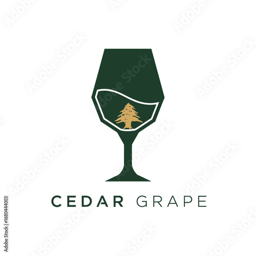 Elegant logo design featuring a wine glass with a cedar tree inside, representing Cedar Grape.