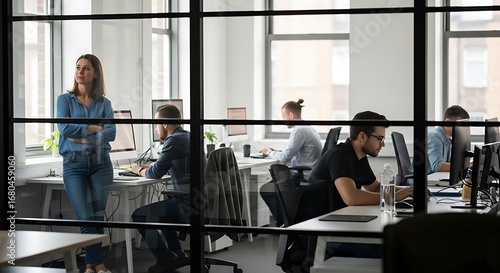 Diverse team members collaborate in a modern office space with natural light and open layout promoting productivity and teamwork with thoughtful design and contemporary aesthetics