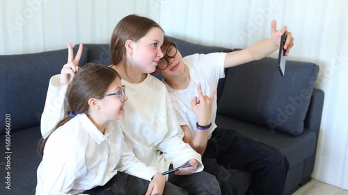 a group of teenagers immerse themselves in the world of selfies and social media