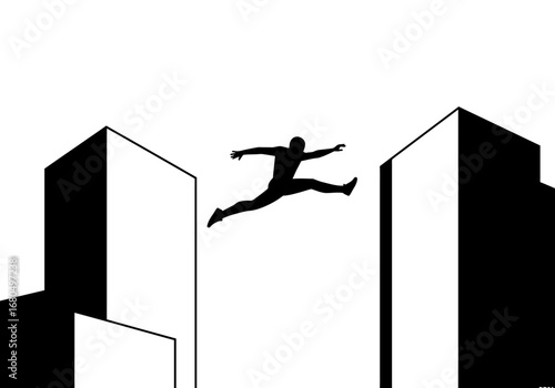 Silhouette of figure leaps between bldgs arms  legs outstretched stark black  white contrast