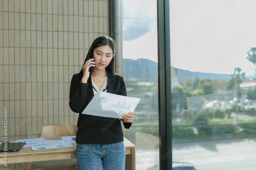 Fototapeta premium orporate leader negotiating a deal on the phone, symbol of power, leadership, and success.