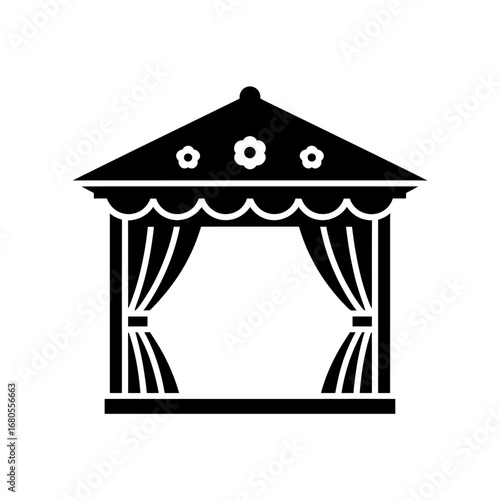 Elegant wedding gazebo glyph with decorative flowers and open curtains. Black silhouette icon for celebration, performance, and union events.