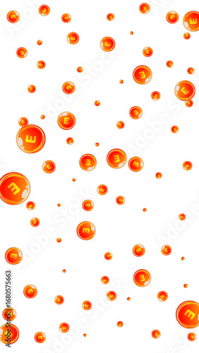 Vitamin E round capsules scattered randomly.
