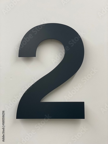 The number two created from 3D metal