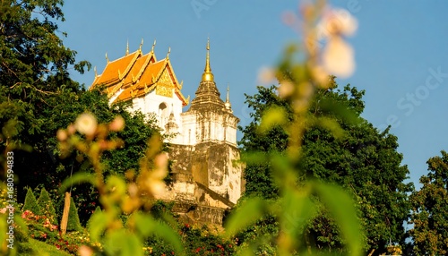 Temple on hilltop with flowers