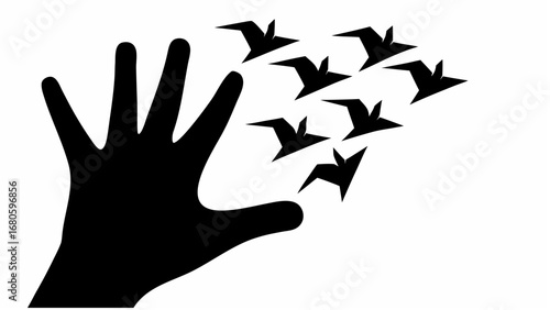 Silhouette of a hand releasing origami birds into the air against a white background in simple black and white