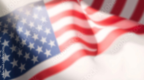 Close-up of a waving American flag with stars and stripes.