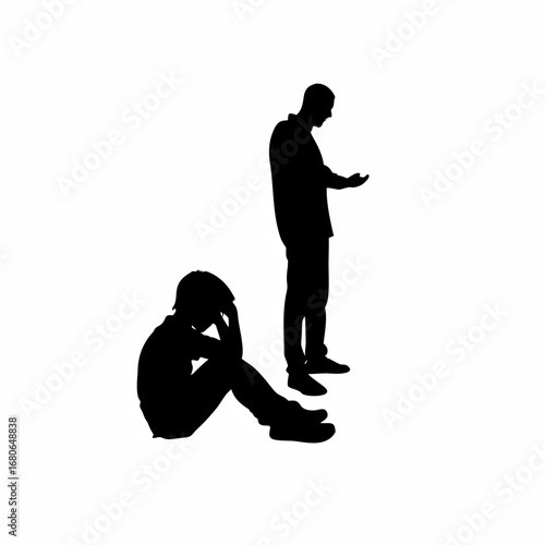 Silhouette of a frustrated father and a dejected son sitting on the floor
