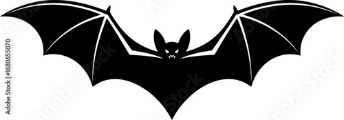 Mysterious black bat with wide wings spread, ready to fly at night