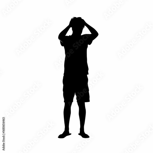 Silhouette of a young man expressing regret and holding his head