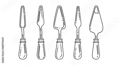 Various spatulas are displayed in a row. Cooking utensils, kitchenware, equipment, tools, bakery, culinary, food preparation, pastry, dessert, serving.
