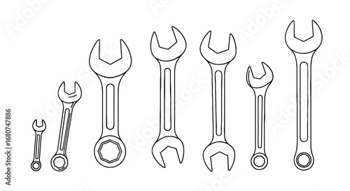 Wrenches of various sizes arranged in a row. Tools, repair, equipment, maintenance, hardware, mechanic, steel, construction, garage, fix, open end