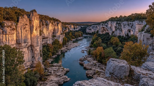 River Through Rocky Gorge At Dusk
