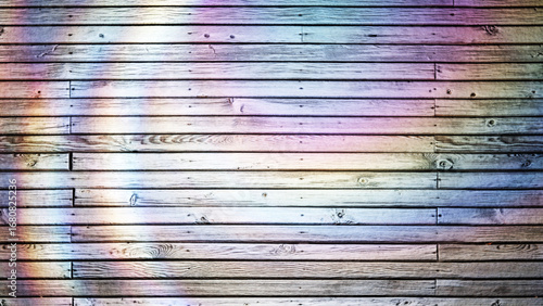 Φωτογραφία Colorful iridescent light diffraction creating a moving circular pattern on wood