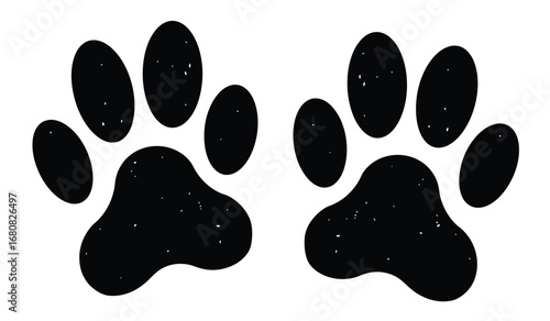 Two black paw prints with distinct toe pads and a larger heel pad isolated on white background