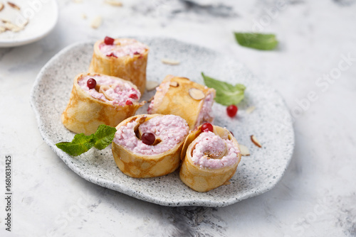 Pancakes with berries and cream cheese