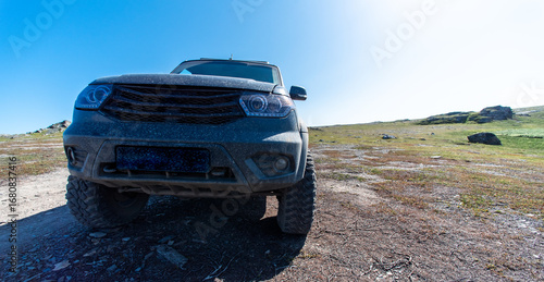 off-road vehicle on the shores of the Arctic Ocean