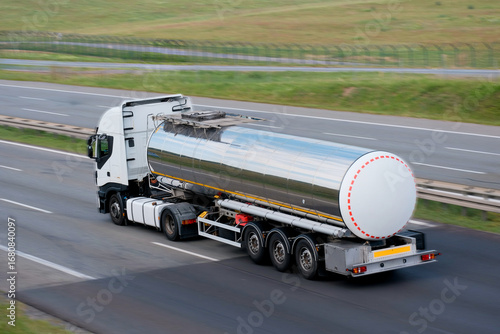 Shiny Road Tanker Truck Transporting Liquid Flammable Cargo