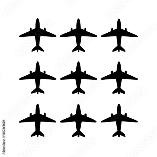 Vector art of nine airplane silhouettes, presenting a variety of aircraft types, suitable for aviation, travel, and transportation designs