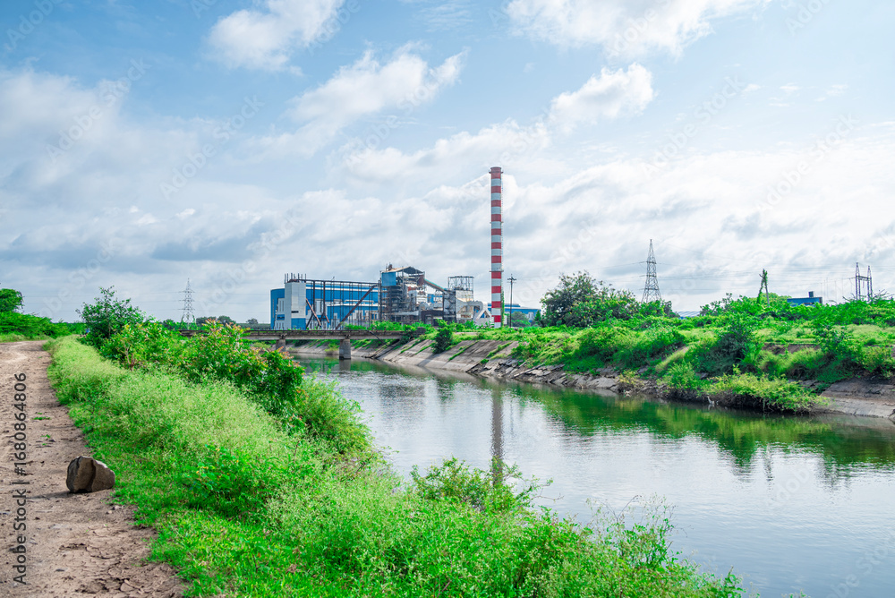 Obraz premium A sugar cane mill is a factory that processes sugar cane to produce raw sugar or plantation white sugar. Increasing air pollution to factory smoke.