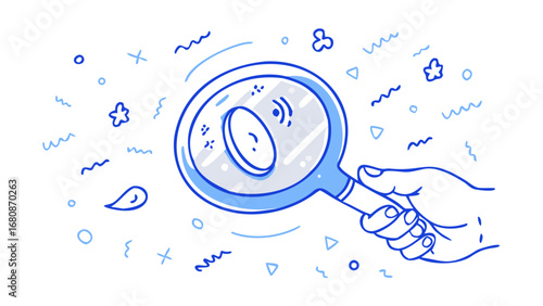 Hand holding magnifying glass over abstract shapes