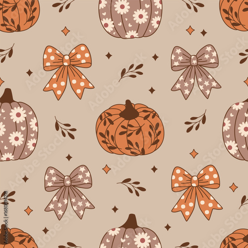 seamless pattern with pumpkins and bows