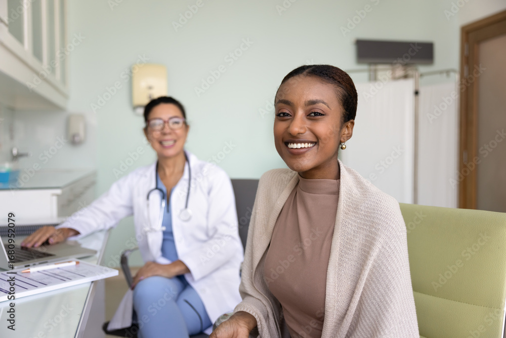 Obraz premium Portrait of African woman patient posing in clinic during consultation