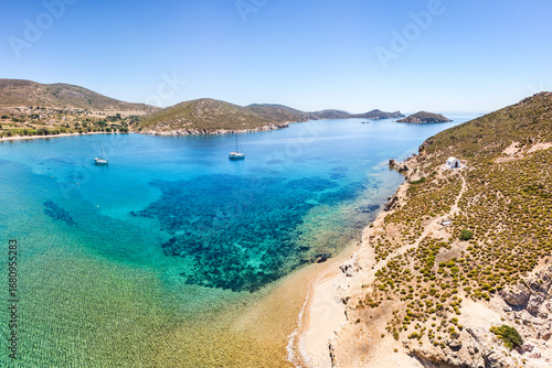 Livadi Geranou Beach and the islet of Agios Georgios in Patmos, Greece