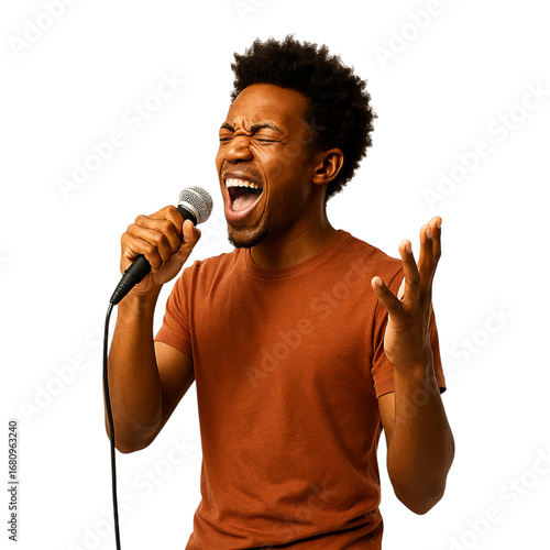 A smiling young black man in a casual black t-shirt holds a microphone to his face while singing