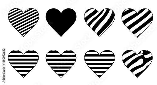 Collection of eight black and white hearts with striped and solid patterns on a white background